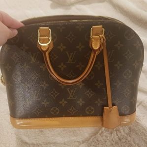 Louis Vuitton Alma MM bag
